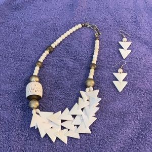 Vintage antique ivory necklace and earrings. Length is 20 inches.